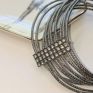 *Bundle and Save* Silver Tone Bangles with Clear Stones